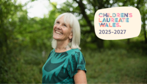 A person standing in a field with trees in the background. Text on the image reads Children's Laureate Wales 2025-2027
